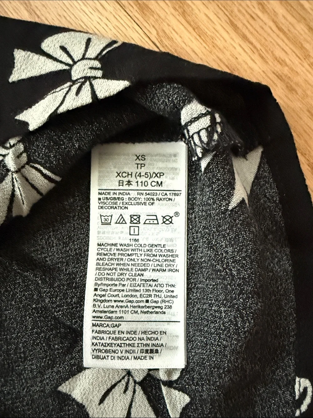 GAP XS (4-5 years) Black Skirt with White Bow Print